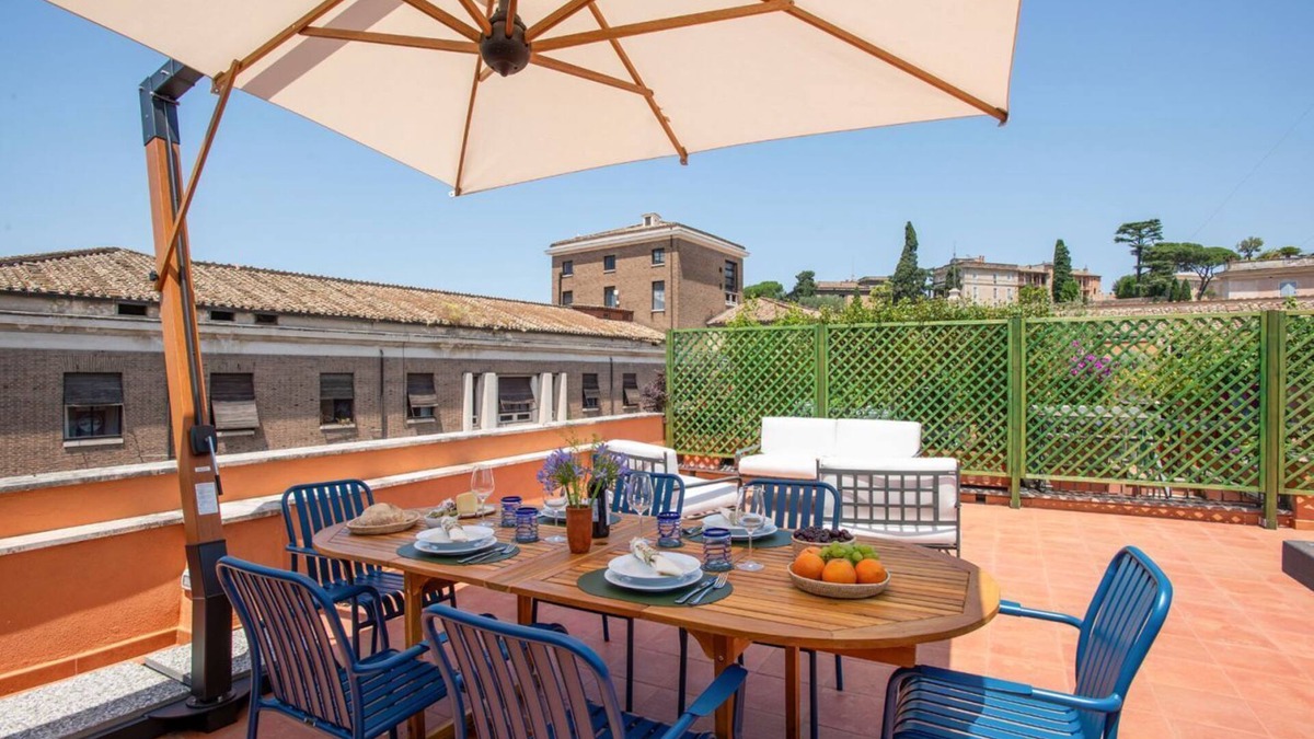 Ripa Apartment | TreasureRome Rooftop Terrace Over Arch of Janus 2BR Duplex