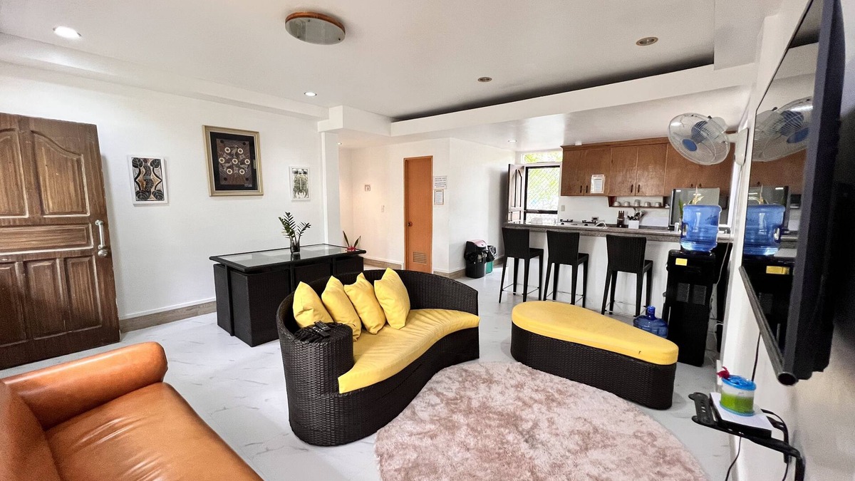 Morong Villa | Triple M Vacation Villas - Yellow house