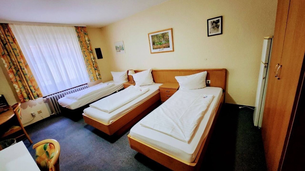 Rastatt Hotel | Triple room-Private Bathroom