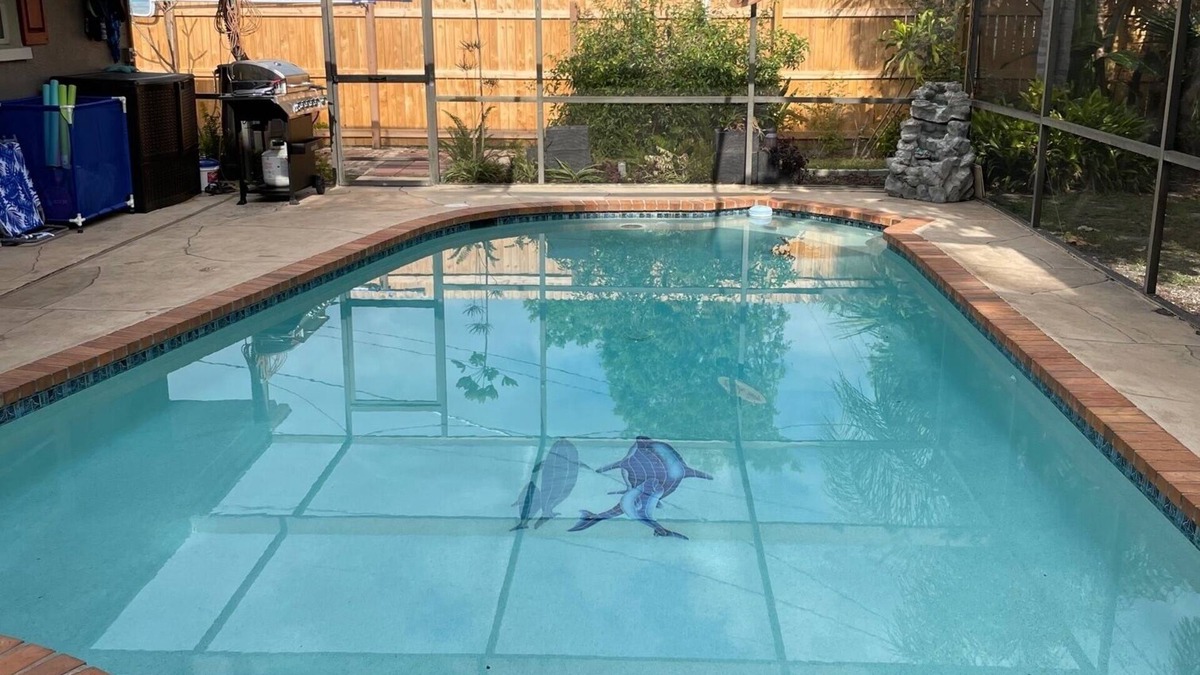 Venice Gardens House | Tropical vacation house with large, heated pool and spacious, open floor plan