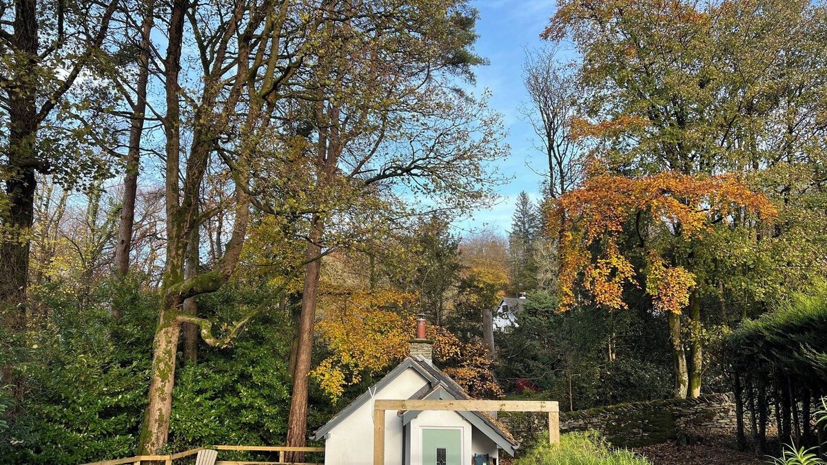 Windermere Cottage | Turn up. Switch off Surrounded by trees with stream nearby, perfect escape for 2