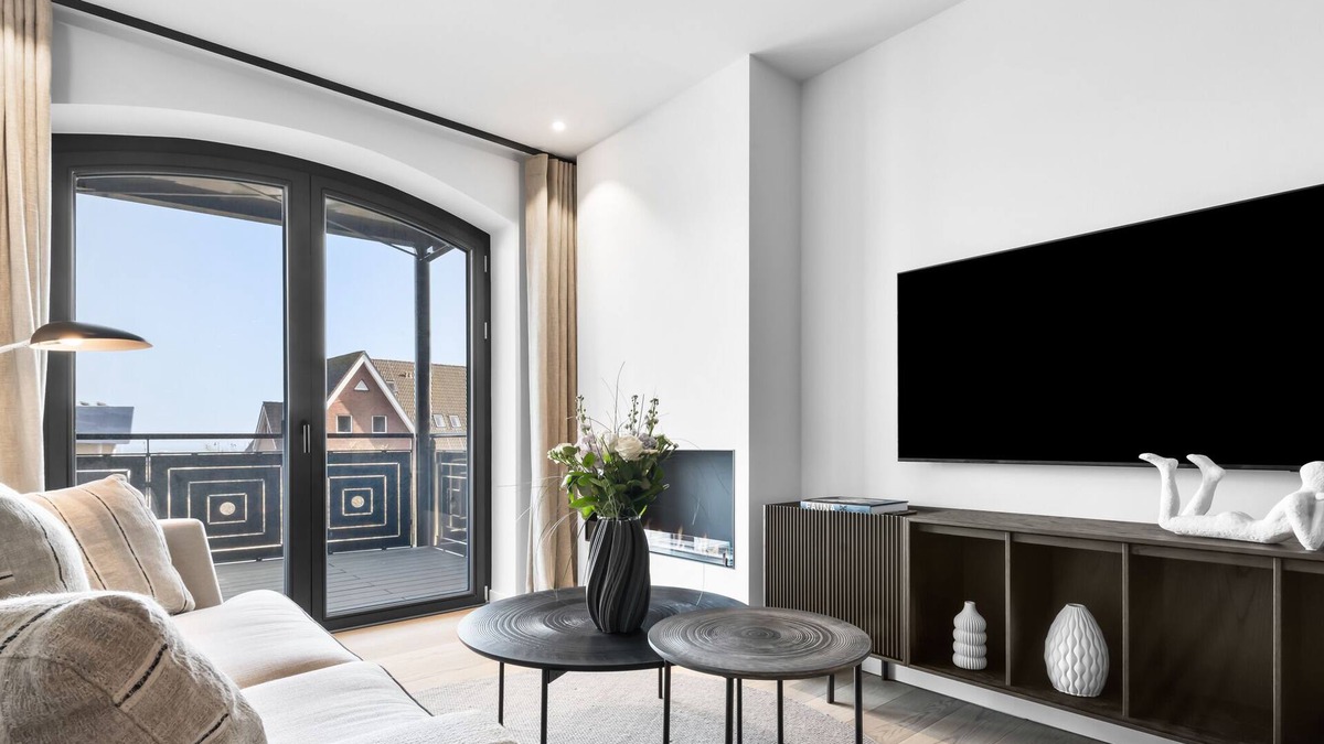 List Apartment | Turtle Bay Suite - Luxury on 65m² in List, Sylt with a Fireplace and Balcony.