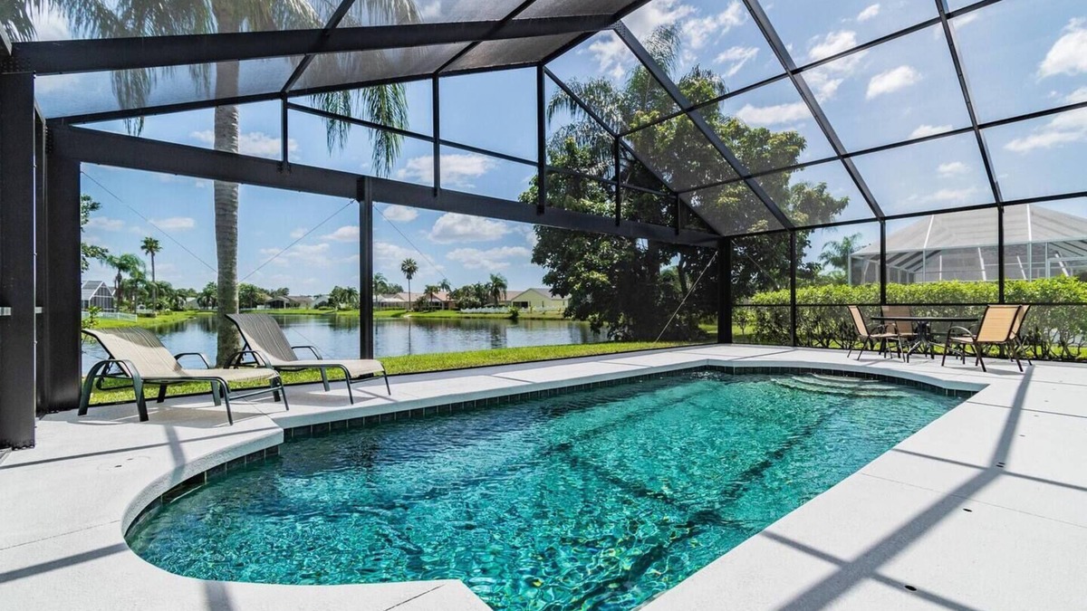 Sabal Harbour House | Turtle Lake - Inspiring Lake Views with Heated Pool