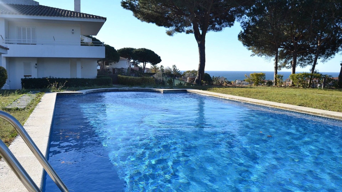 Sant Pol De Mar Villa | Twin villas with large pool and sea views near Barcelona. Free wifi, a/c