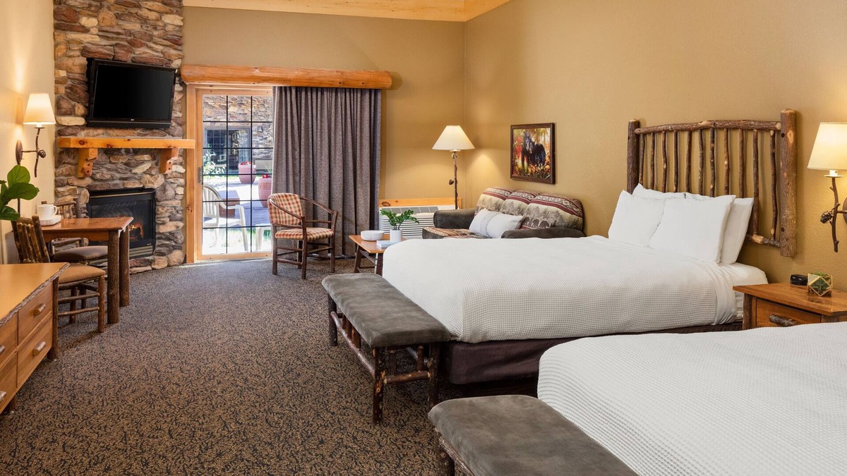 Rothschild Hotel | Two Queen Fireplace Suite With Access to Pool, Hot Tub, and Gym