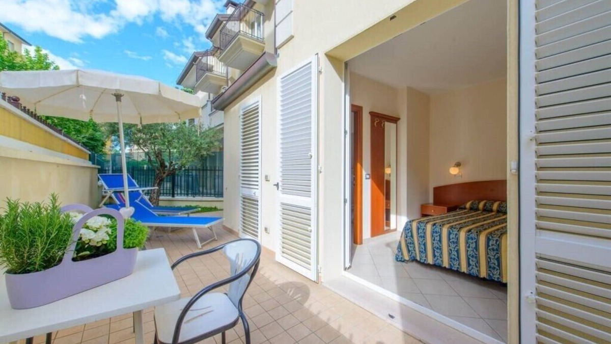 Viserbella Apartment | TWO-ROOM APARTMENT 20 meters from the sea with courtyard, in Viserba, with covered parking.