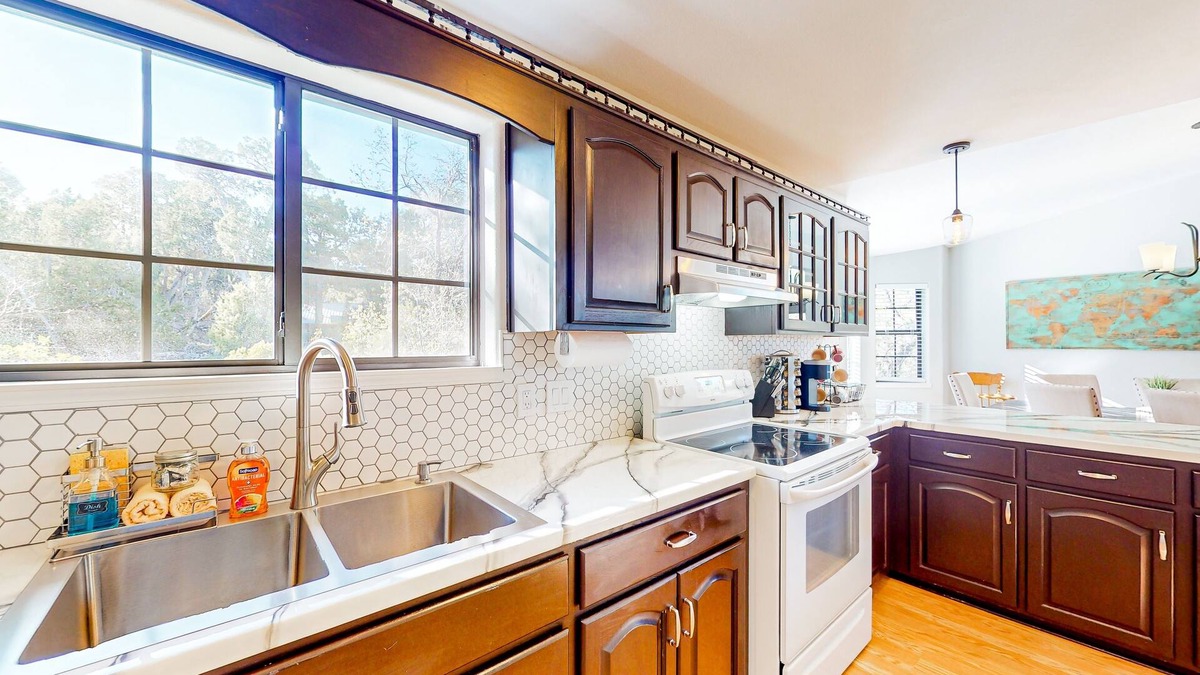 Timberland Acres House | Two-story home with large deck, private bbq grill, and scenic views