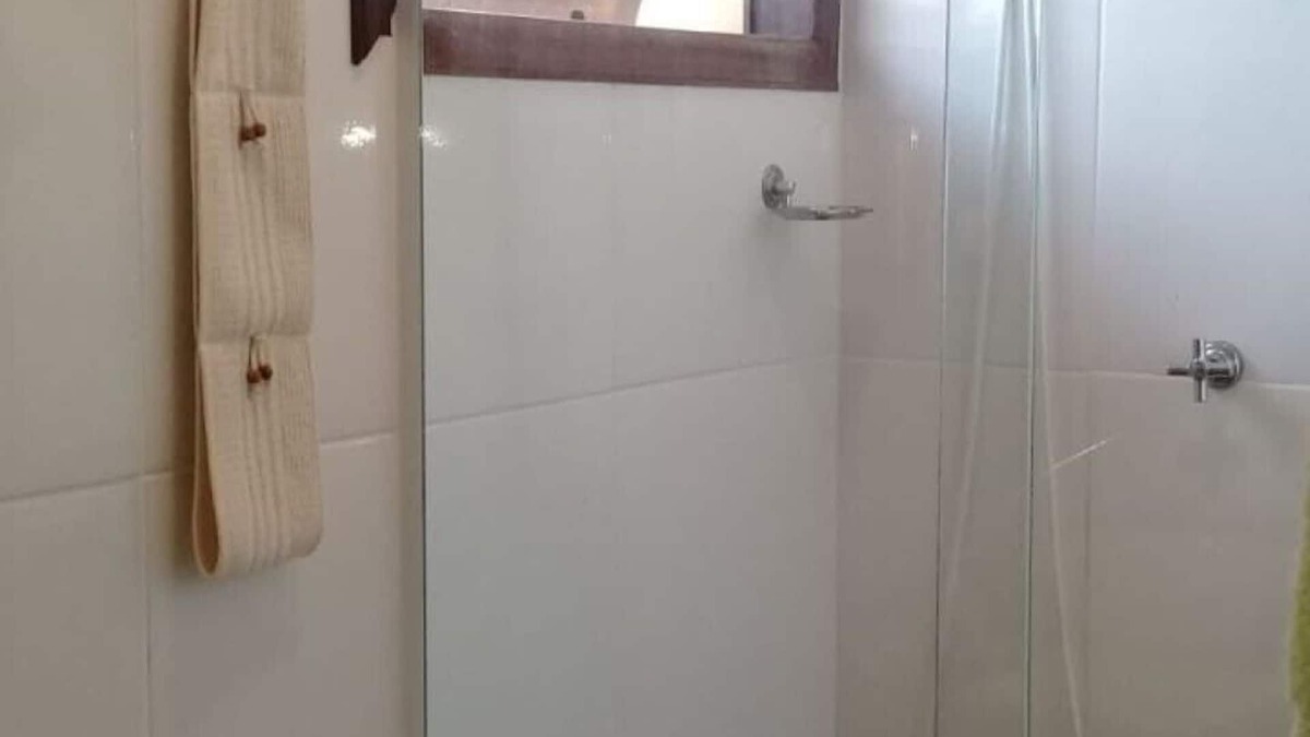 Morro do Algodao House | Two-story house in a gated community
