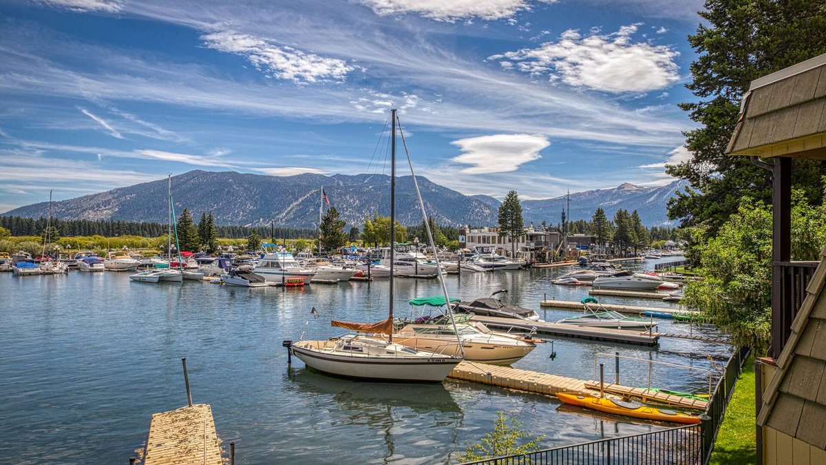 Tahoe Keys Condo | Two-story lakefront condo with access to dock, hot tub, pool & tennis