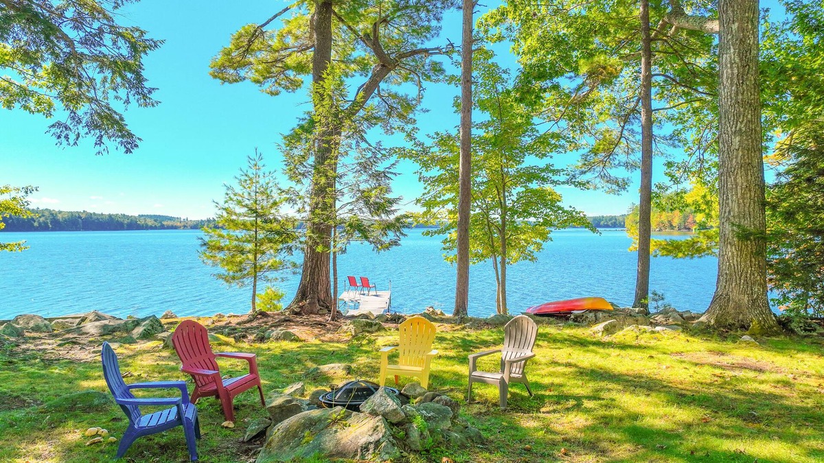 South China House | Two-story lakefront home with a seasonal dock, furnished deck, & washer/dryer