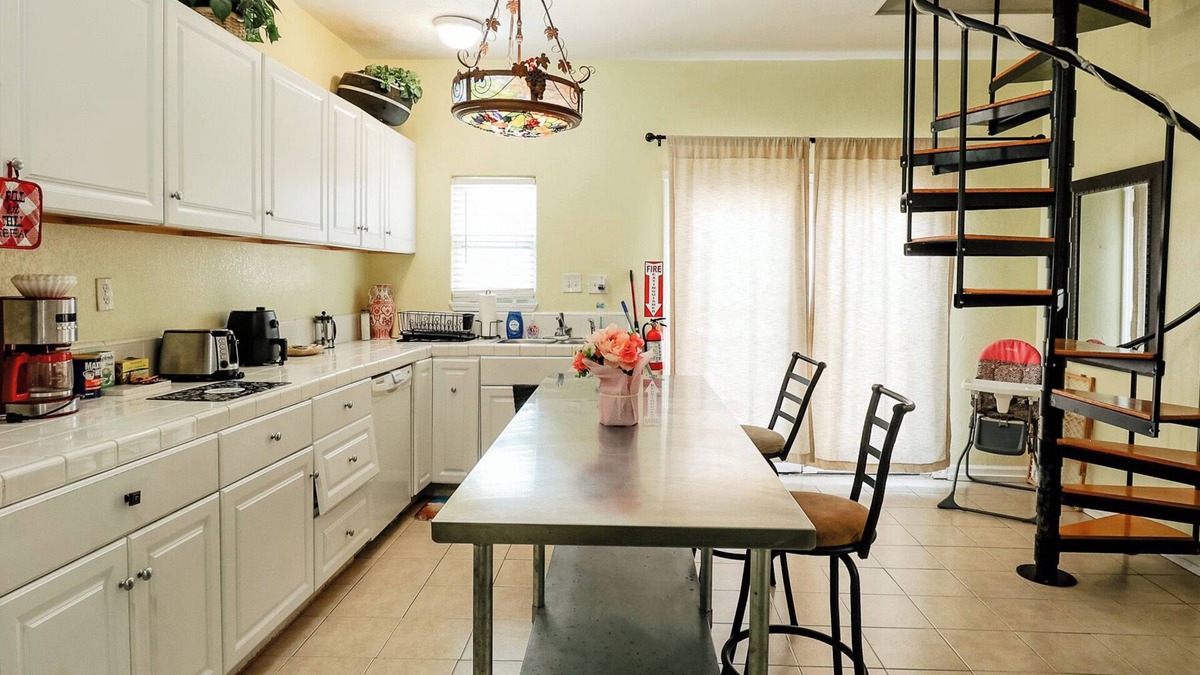 San Jacinto House | Two Story Yellow home