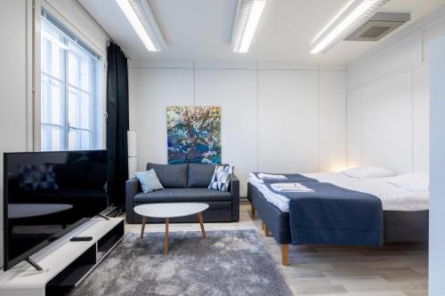 Varkaus Apartment | Tyylikäs City studio, Terassi ja ilmainen parkki Vanha Postitalo