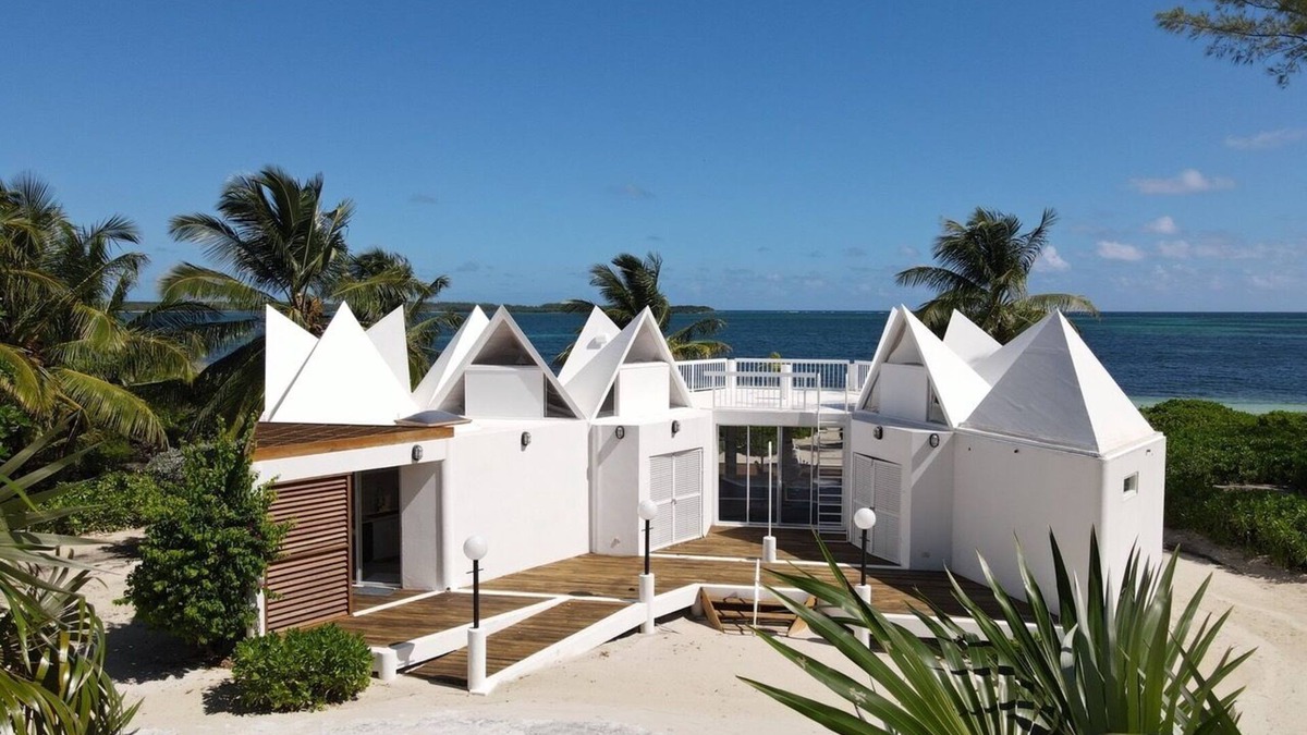 Winding Bay House | ULTRA LUX Coconut Cove Compound! 2.5 acres with 300 ft PINK SAND BEACH