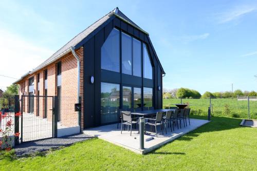 Boue House | Un nid dans la Grange - Maison avec jacuzzi et sauna