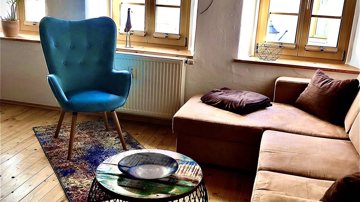 Altstadt Apartment | under a historical exposed wooden beam ceiling, monument protection