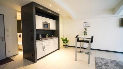 Zentrum-Suedost Apartment | Uniklinik Zentral Küche Fitnessraum