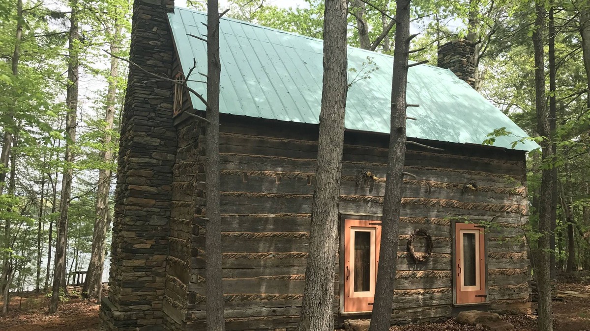 Huddleston Cabin | Unique Historical log cabin with private beach and 300 ft. of waterfrontage.