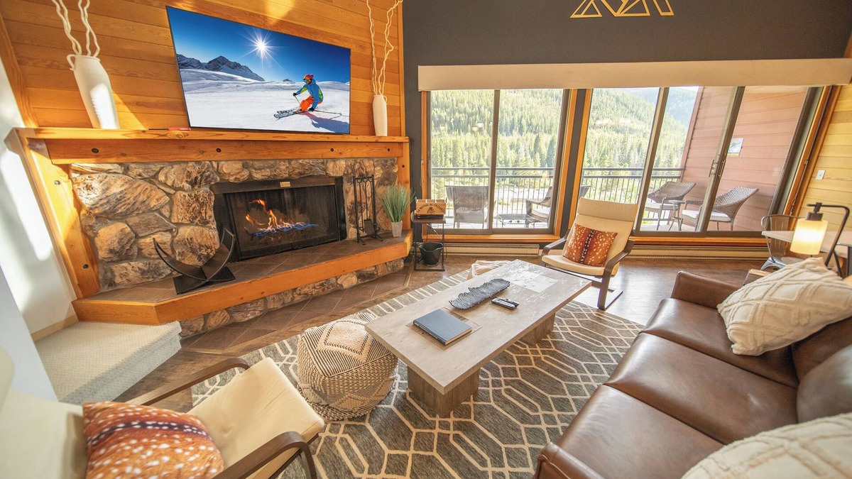 Lakeside Village Condo | Unit with wood burning fireplace and free shuttle