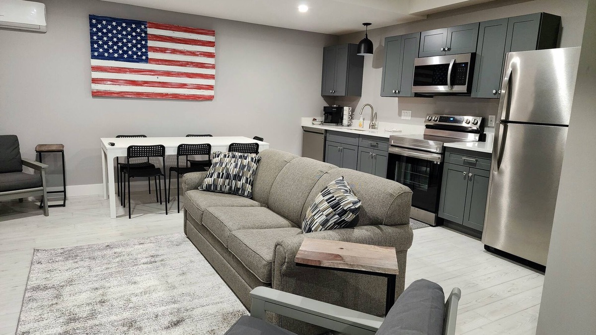 Mancelona Condo | Unpack and relax with a Mountain view. New! Sleeps 6 Pools, New construction.