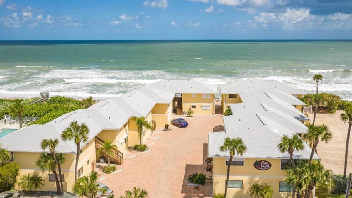 Satellite Beach Condo | Updated Condo with Beach View 30 steps away from your toes being in the sand!