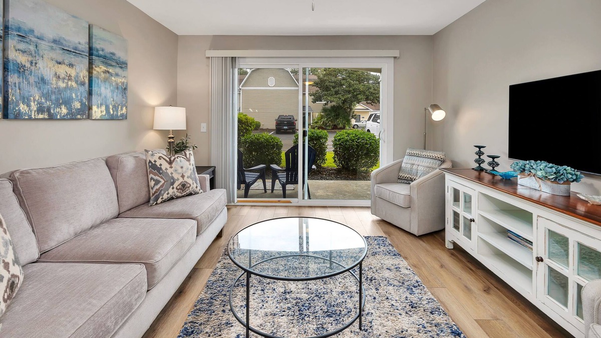 Demere Park Condo | Updated first floor condominium with access to heated pool and tennis courts!