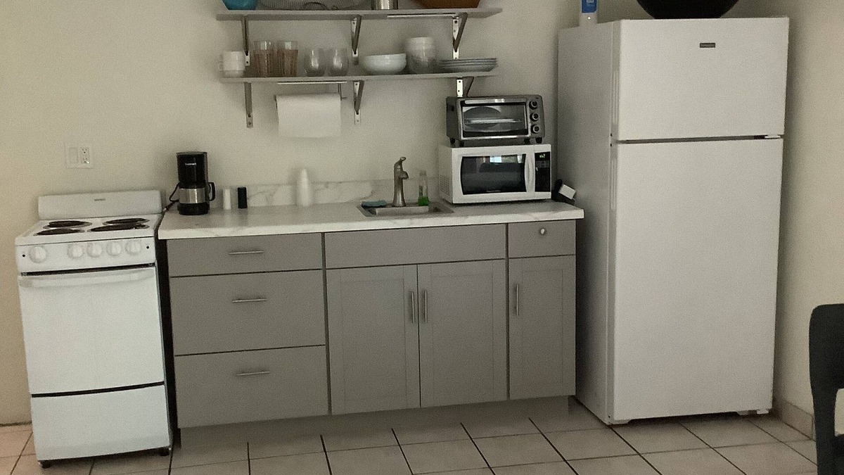 New Town Cottage | Uptown quiet cottage close to beaches, restaurant & shopping.