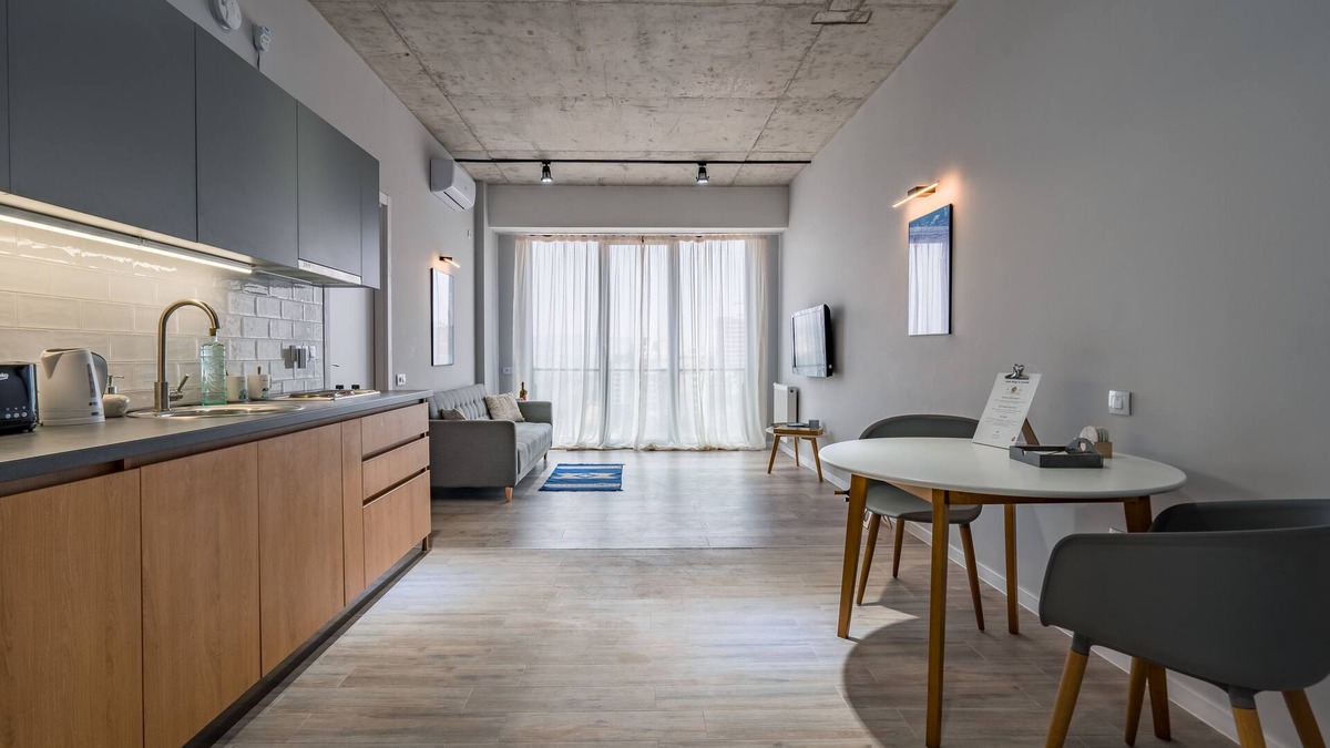 Vake Condo | Urban Loft Apt Ideal for Workcation, Couples & Families