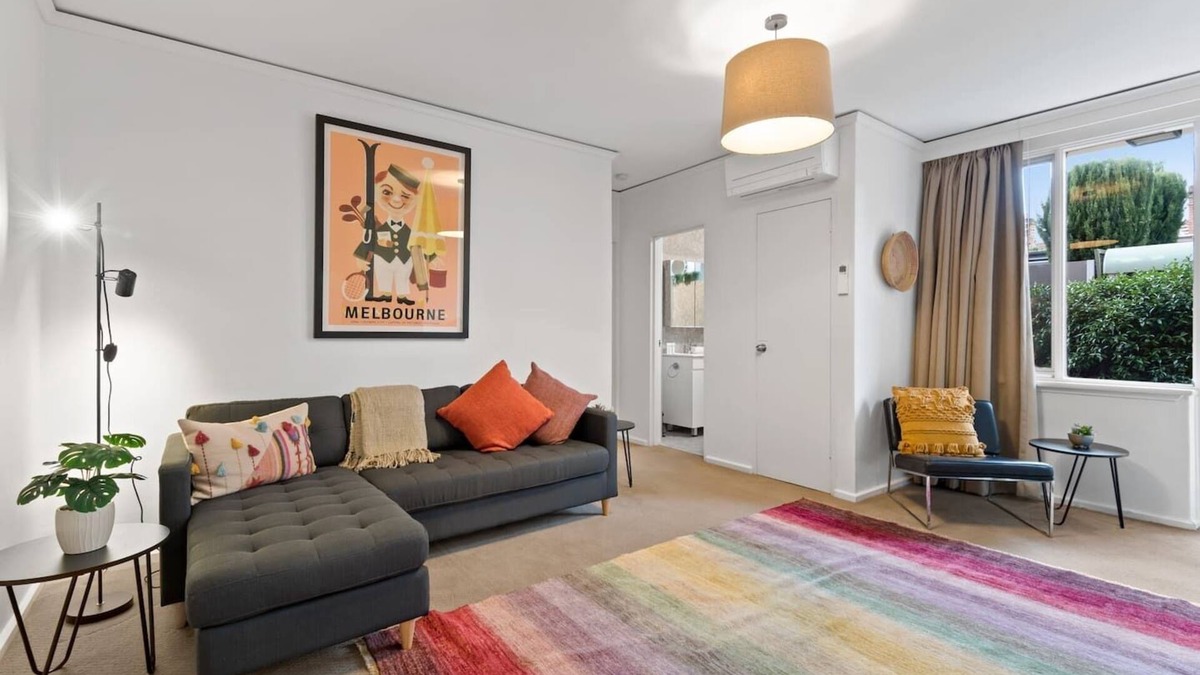 Prahran Apartment | Urban Retro Experience Vibrant Courtyard Charm