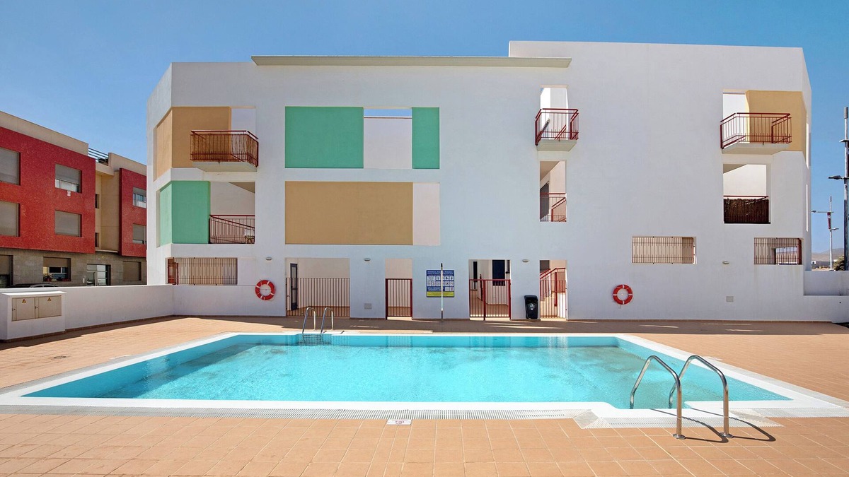 Puerto del Rosario Apartment | Vacation Apartment 'Lancelot' with Shared Pool and Wi-Fi
