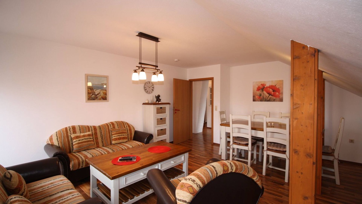 Pilsum Apartment | Vacation apartment "Leuchtturm" with large garden in the heart of Pilsum