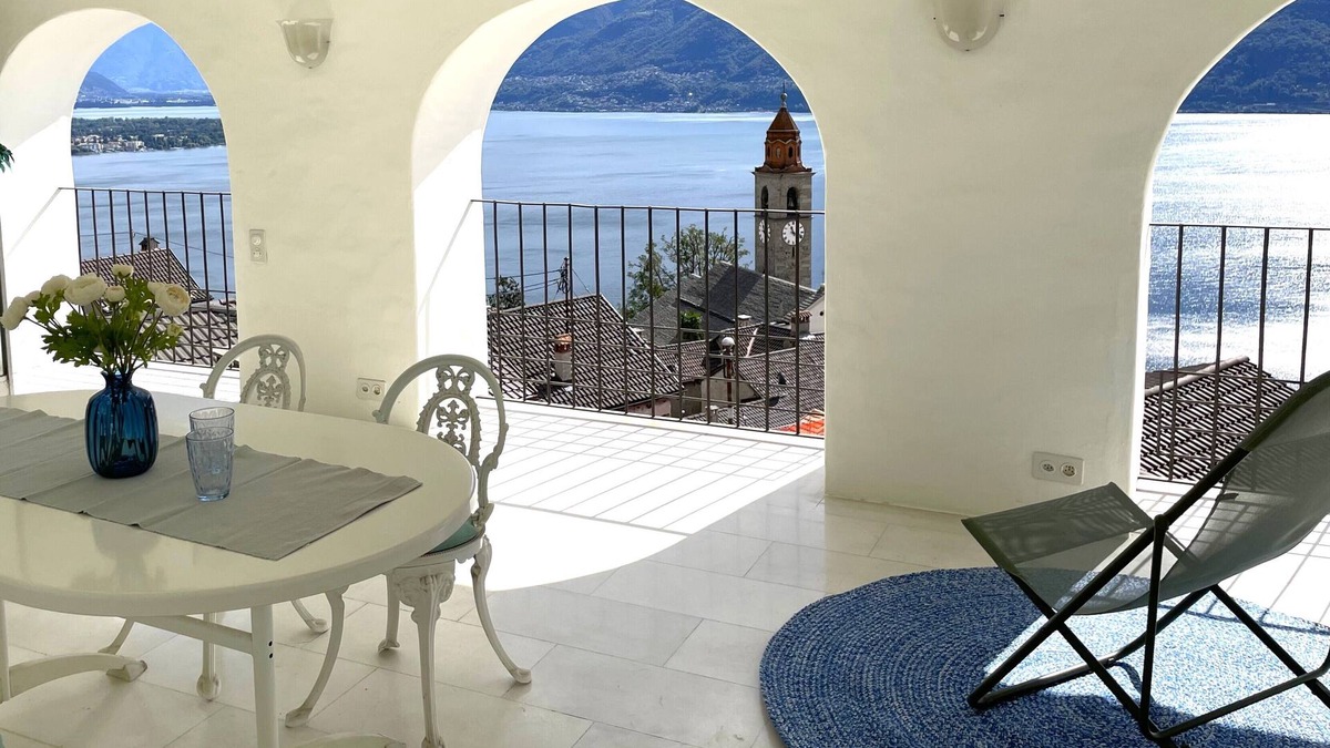 Porto Ronco House | Vacation home in the heart of the village with roof terrace and spectacular views