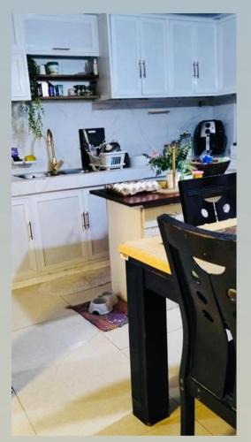 Trece Martires House | Vacation Home by Rowena Sacarez