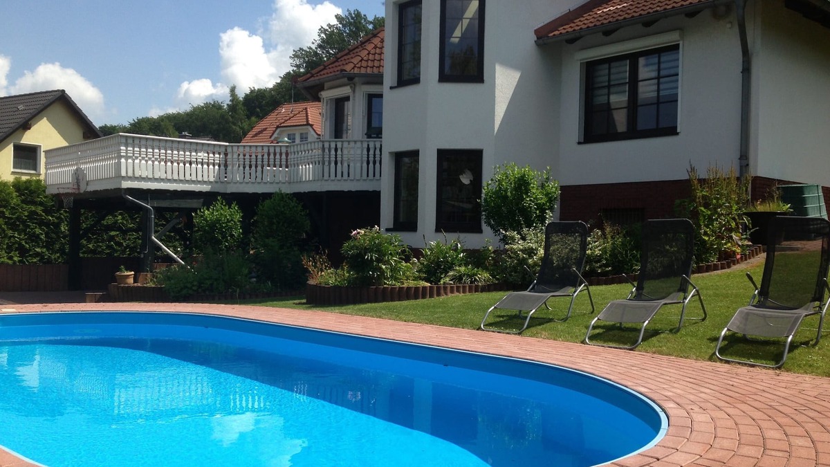 Ballenstedt House | Vacation home for 8 guests with pool, fireplace, playground, large garden