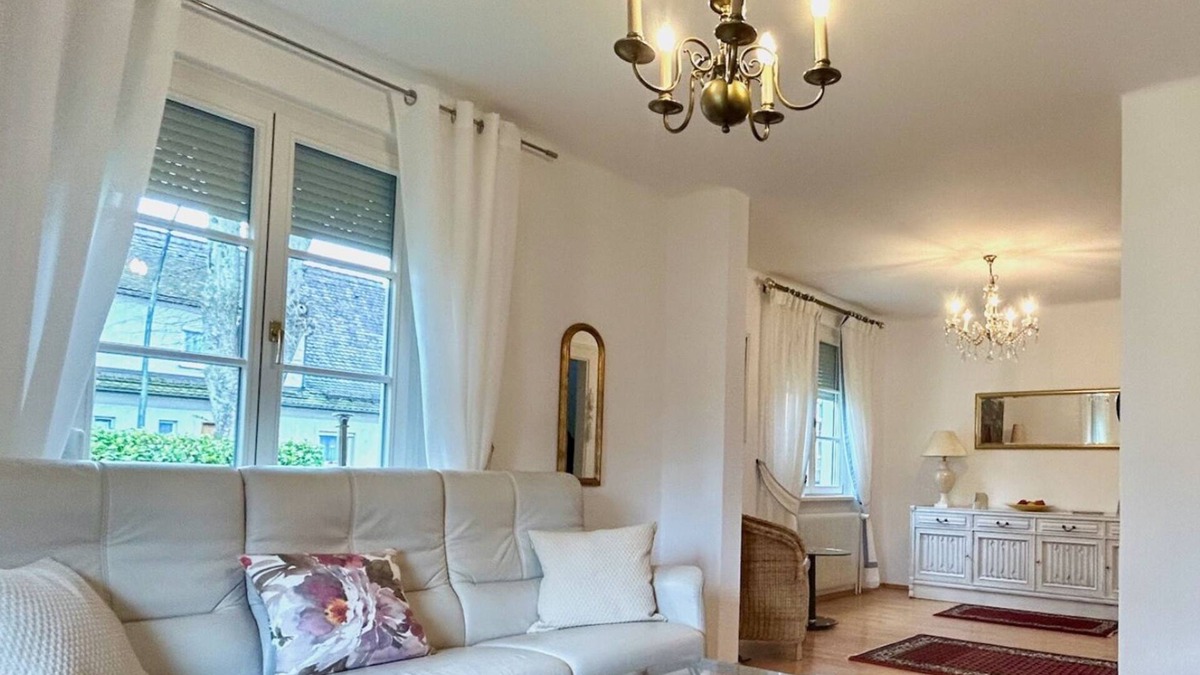 Reutin House | Vacation home Köchlin - charming semi-detached house with garden and parking space