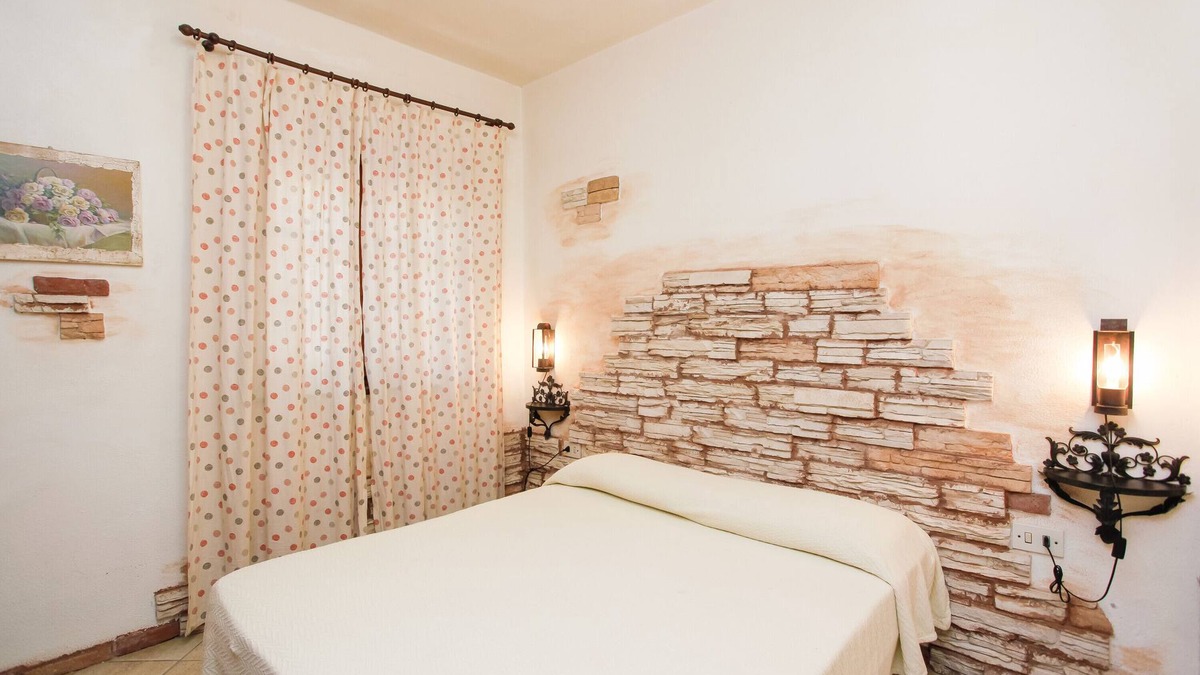 Agrustos House | Vacation Home "La Casa dell'Olivastro" with Private Terrace & Wi-Fi
