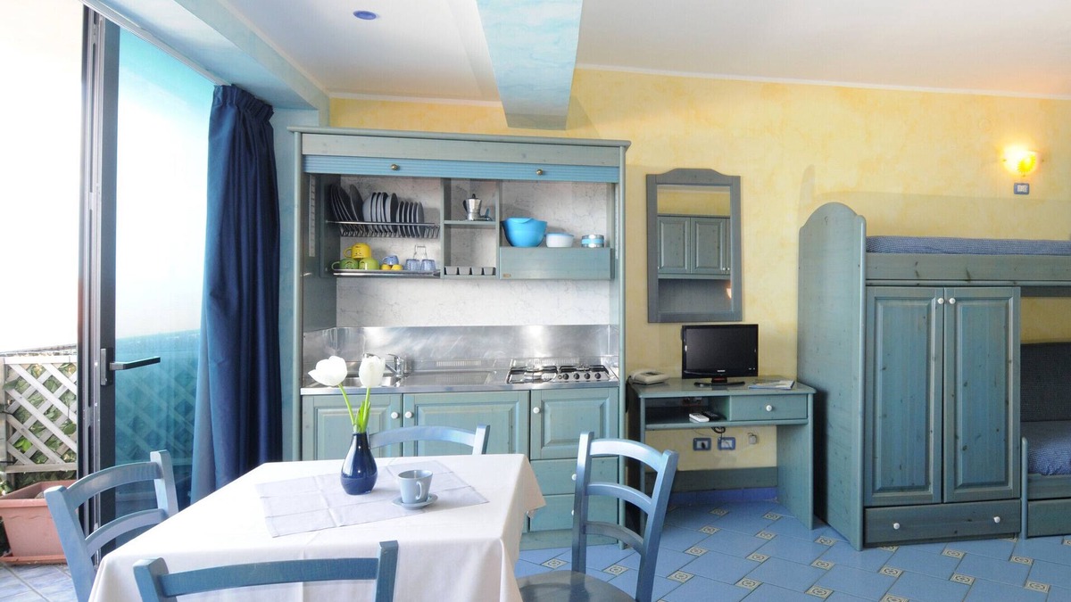 Province of Messina House | Vacation Home "Oasi Azzurra - Monolocale Standard 1" with Shared Pool & Shared Terraces