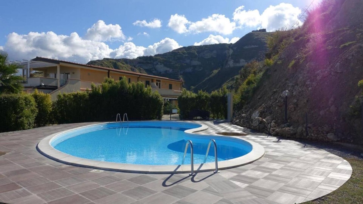 Parghelia House | Vacation Home "Terrazzo A9" with Sea View, Shared Pool & Wi-Fi
