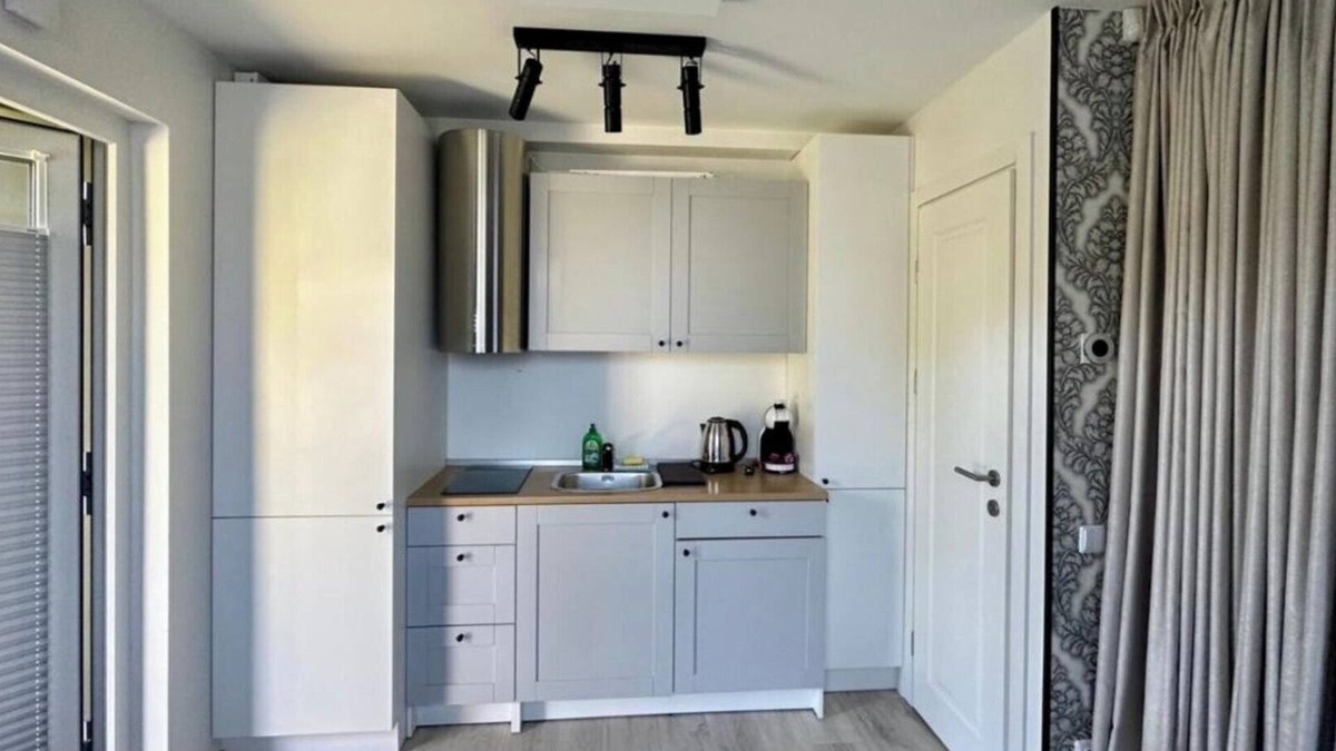 Palanga Apartment | Vaivorykstes Namai with Heated Pool by Hostlovers