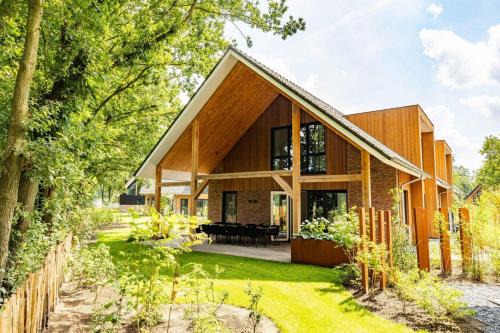 Wekerom Villa | Veluwe Villa met Binnenzwembad & Wellness - 12 personen