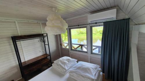 Kurzeme House | Ventas - viesu māja un laivu noma