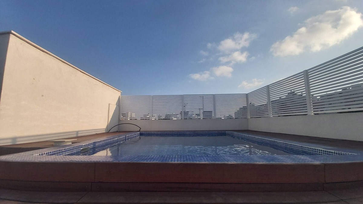 Netanya Cottage | Very beautiful penthouse with a hot swimming pool under blue skies .