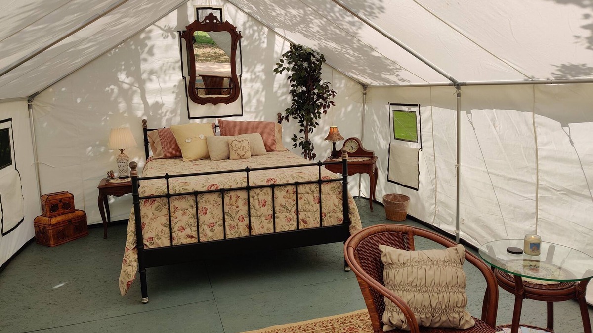 Glacier Country Cabin | Victorian Dream, glamping by the river, 2 miles from Quinn's Hot Springs Resort.