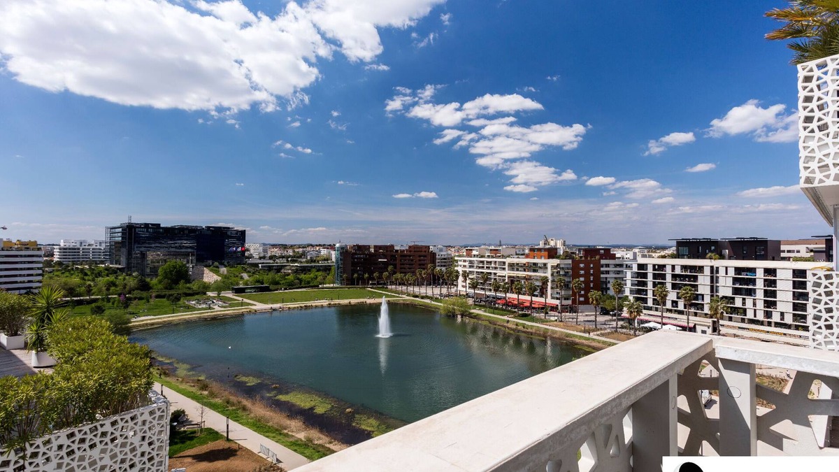 Port Marianne Apartment | View of Bassin Port Marianne: parking + terrace ☀