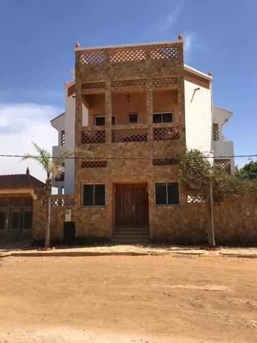 Toubab Dialao Apartment | villa artcanes 1