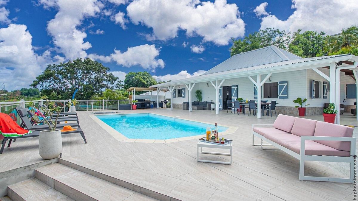 Le Vauclin House | Villa Cacyli: private heated pool and Jacuzzi, view of Baie des Mulets