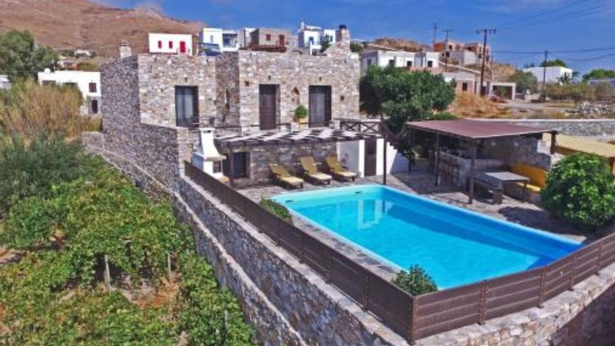 Megas Gialos Villa | Villa Camellia is a beautiful stone house overlooking the sea.