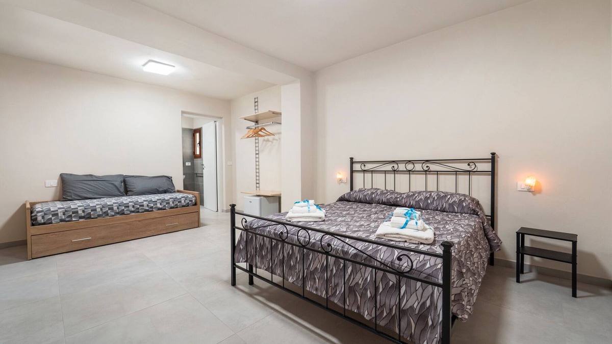 Guspini Apartment | Villa Giovia: Family Room 3