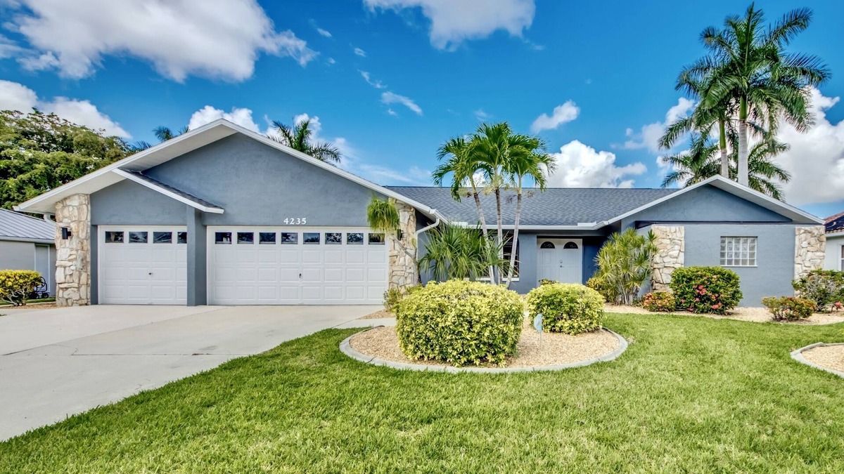 Lochmoor Waterway Estates Villa | Villa Journey - newly renovated, large pool, adjoining small park with lake