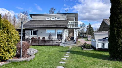 Pori Villa | Villa Krystle - Riverside Retreat
