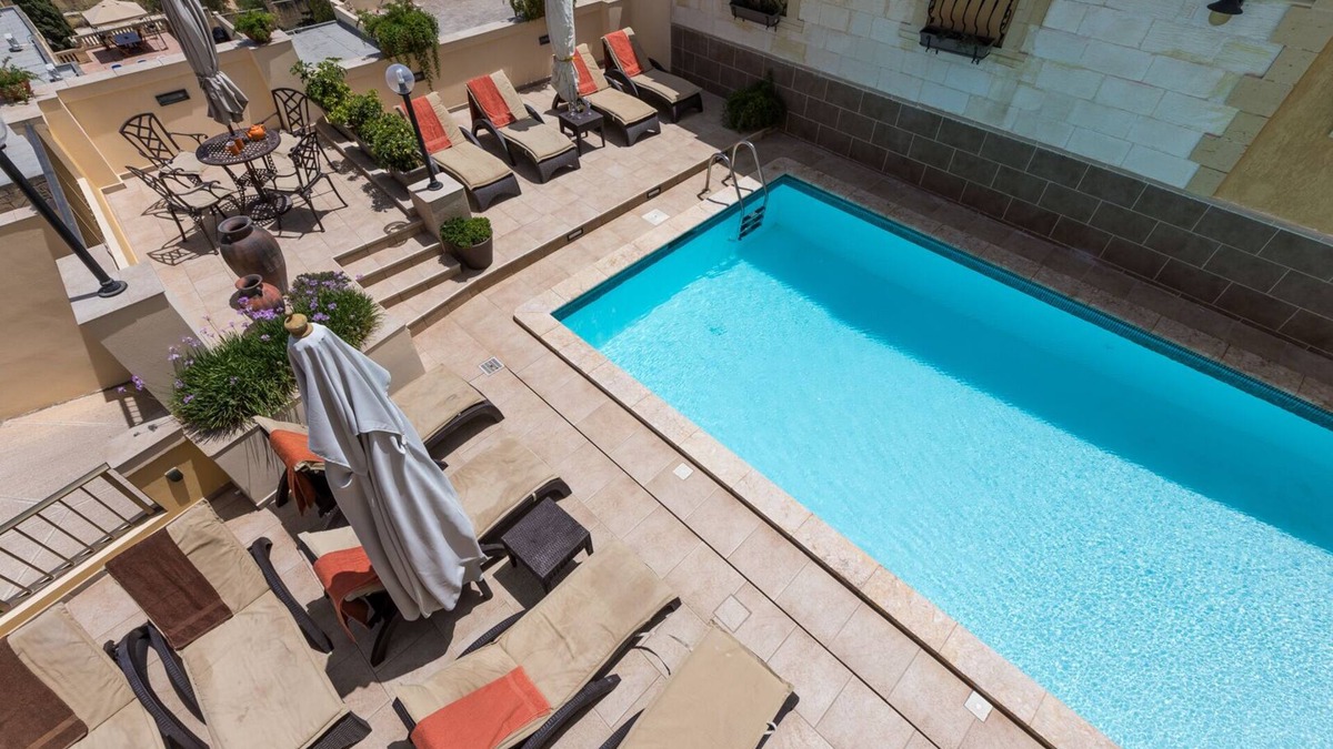 Santa Maria Estate Apartment | Villa Margherita Unit 1, with a large Pool, patio, and spacious outside spaces.